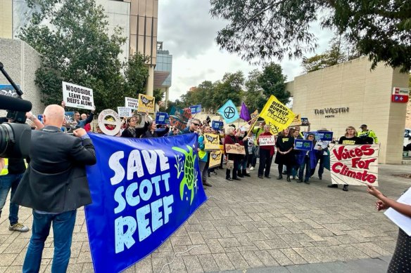 Protesters outside the Australian Institute of Company Directors (AICD) Annual Awards lunch in Perth, where Woodside boss Meg O’Neill is speaking. 