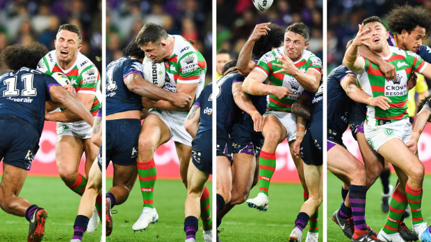 The enforcer: Sam Burgess loses the ball after being crunched by Felesi Kaufusi.
