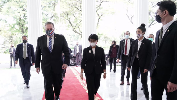 Walk this way: US Secretary of State Mike Pompeo with Indonesia's Foreign Minister Retno Marsudi in Jakarta on Thursday.