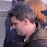 Police lead away white supremacist Jacob Hersant, who heckled the Welcome to Country at the dawn service at Melbourne’s Shrine of Rememberance.