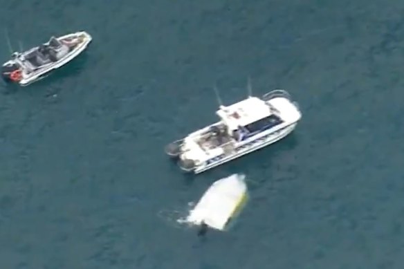 One person is dead after a boat with seven people on board capsized in Bulli waters north of Wollongong on the NSW South Coast on Sunday.