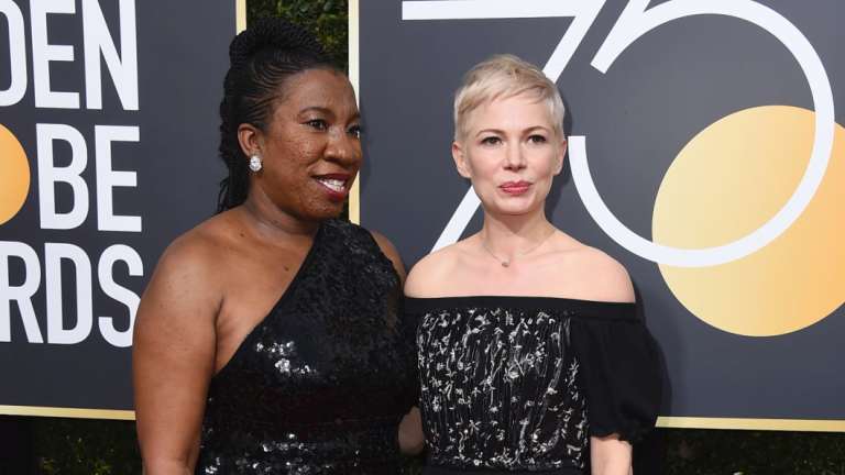 Tarana Burke, left, and Michelle Williams arrive at the 75th annual Golden Globe Awards at the Beverly Hilton Hotel on Sunday, Jan. 7, 2018, in Beverly Hills, California. 