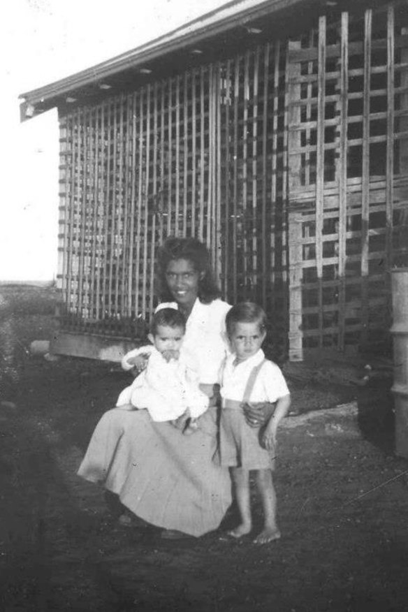 Young Ken with his mum and baby brother Lindsay. “We would never get a hug from Mum because they were never hugged as children.”