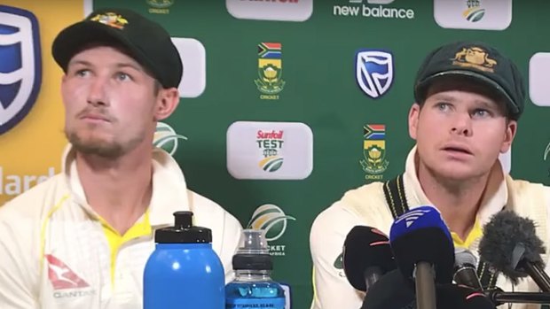 The unravelling: Cameron Bancroft and captain Steve Smith admit to ball tampering at a press conference in Cape Town.