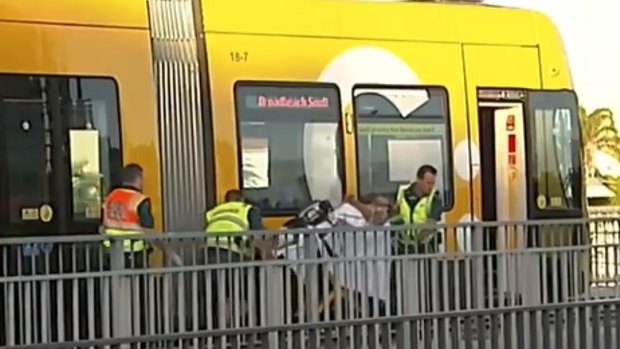 Gold Coast trams were suspended in Surfers Paradise for more than two-and-a-half hours on Friday morning.