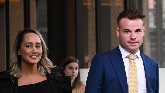 Taking matter in his stride: Taylor Auerbach leaves Federal Court on Friday, with his solicitor Rebekeh Giles by his side.