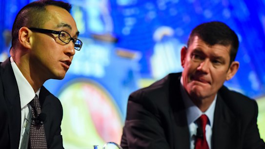Melco boss Lawrence Ho (left) and James Packer. Mr Ho sold his stake in Crown Resorts in April.