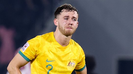 Lachlan Brook struggles to hold back tears after Australia’s elimination.