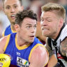 Mature Lions find the answers when challenged by gutsy Collingwood