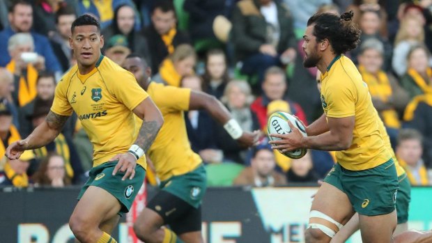 Israel Folau and Karmichael Hunt in action for the Wallabies in 2017 against Fiji. 