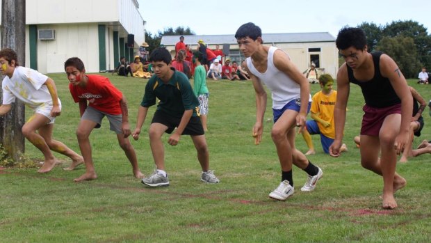 “I was as skinny as”: Joey Manu (white singlet) lines up for the school 100m in Year 7.