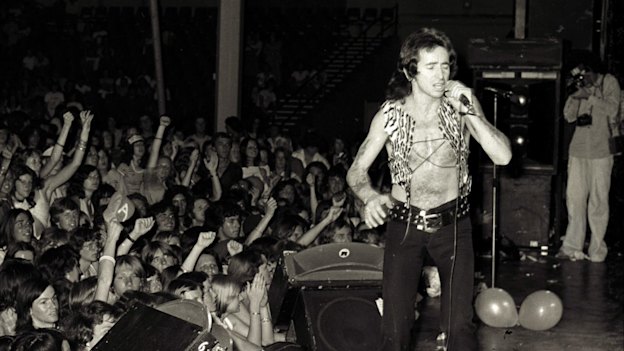 Bon Scott on stage with the band at the Hordern Pavilion in Sydney on December 12, 1976.