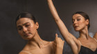 Australian Ballet dancers Valerie Tereshchenko (white) and Benedicte Bemet (black) who will be performing in the brand new production of the ballet classic Swan Lake.