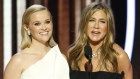 Stars of The Morning Wars Reese Witherspoon, left, and Jennifer Aniston at the 77th Annual Golden Globe Awards .