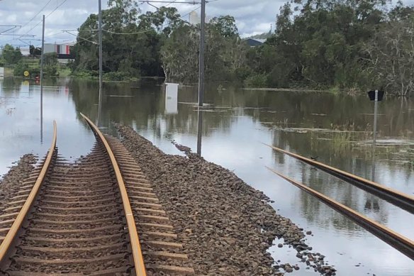 “Right across the network, we’re seeing ... parts of track still flooded,” Transport Minister Mark Bailey says. 
