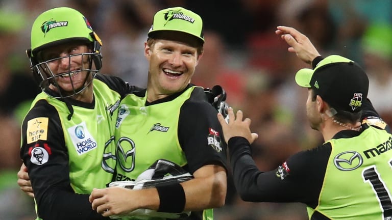 Storming home: Shane Watson of the Thunder celebrates with teammates after catching out Ashton Agar of the Scorchers.