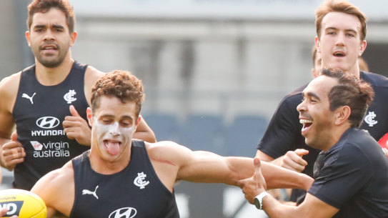 Eddie Betts and Liam Stoker share a laugh at training during this preseason. 
