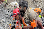 Two workers have been pulled alive from a hydropower tunnel.