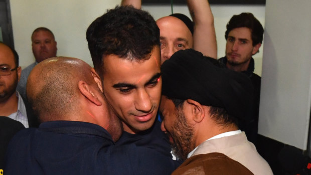 Hakeem al-Araibi is greeted by friends and supporters as he arrives in Melbourne.