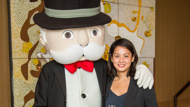 Maryam Awang alongside Mr Monopoly.