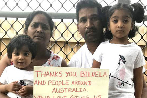 Priya and Nades Murugappan and their Australian-born children, Tharnicaa and Kopika, in a photo taken during their court fight to remain in Australia.