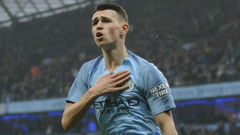 Manchester City's Phil Foden celebrates after scoring against Rotherham United in the FA Cup at Etihad Stadium on Sunday.