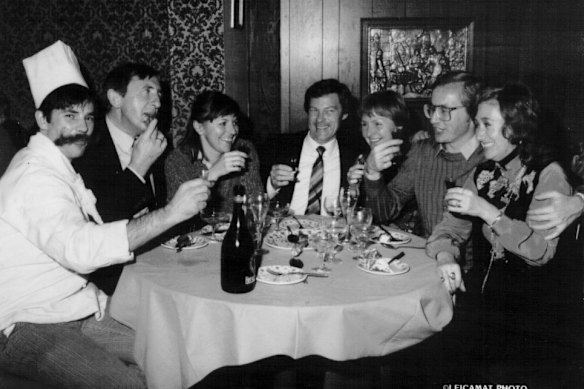 Rudi Dietz (left) with diners at his Crows Nest restaurant in 1996.