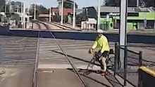 Near misses on train tracks have been revealed as leaders call for pedestrians and cyclists to stop taking risks.