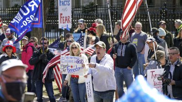 Hundreds of protesters gathered outside Minnesota Governor Tim Walz's official residence last week to protest against the state's stay-at-home order.