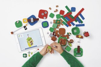 The app shows how elements are constructed, and teaches players how Mario interacts with the levels to score points.