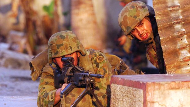 Australian troops securing the streets of Dili.