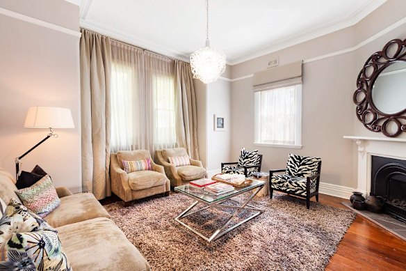 The home is a five-bedroom, five-bathroom property with a pool and landscaped gardens. 