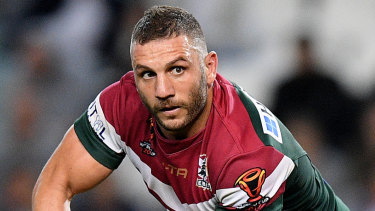 Charged: Robbie Farah.