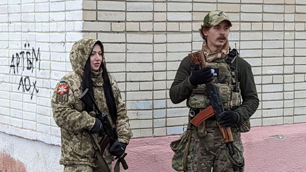 Felix Metrikas, pictured with a Ukrainian nurse in Kharkiv, has been training troops since the early months of the war.