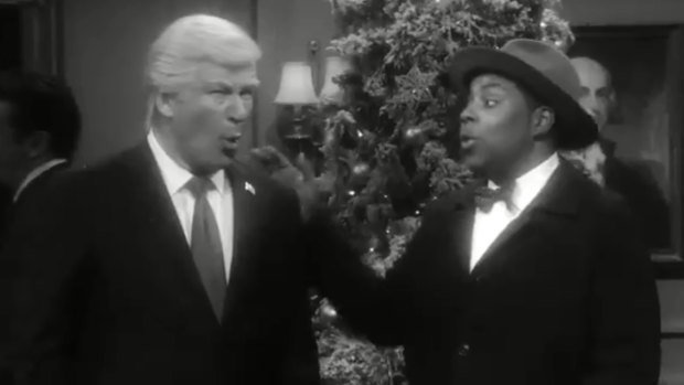 Baldwin as Trump, with Kenan Thompson, in the SNL skit.