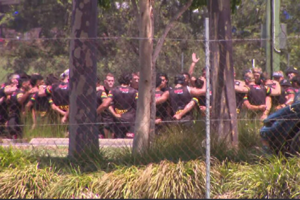 Panthers players form a huddle for Jarome Luai at training on Saturday.