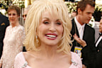 Wearing a custom Robert Behar pink chiffon gown to the 2006 Oscars.