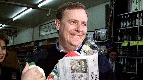 Peter Costello buys groceries on the first day of the GST ion July 1, 2000. The GST marks the last far-reaching reform of the nation’s tax system.