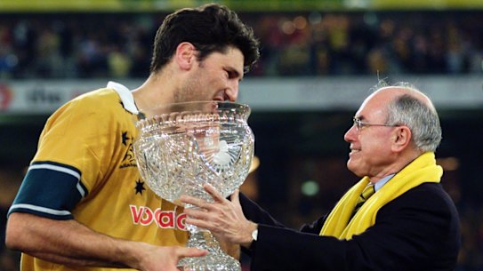 Wallabies captain John Eales (left) and Prime Minister John Howard (right) after the 2001 British and Irish Lions decider. 