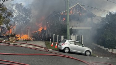 Multiple Queensland Fire and Rescue crews are on scene at a fire that is affecting several properties on Evelyn St, Grange.
