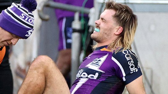 Ryan Papenhuyzen goes down with a serious knee injury.