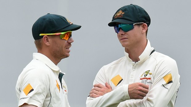 David Warner (left) can expect some sledging from England fans, according to Joe Root.
