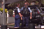 A large police presence remains on scene. 