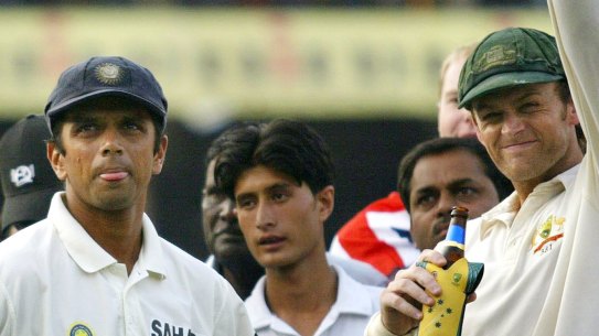 Stand-in skipper Adam Gilchrist with Indian captain Rahul Dravid in Nagpur, 2004.