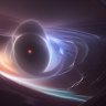 Queensland scientists ‘placed a particle near a black hole’. What they saw stunned them