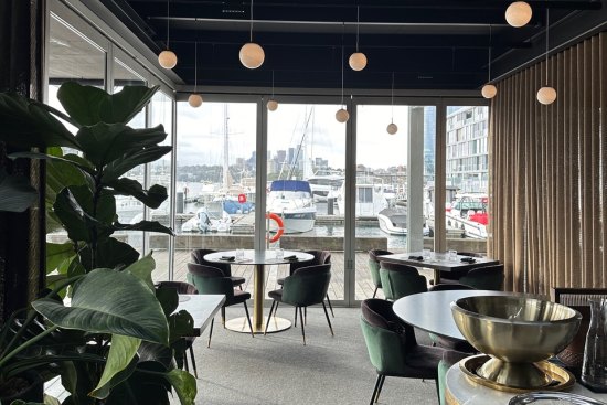 Hanging pendant lights illuminate the LuMi dining room.