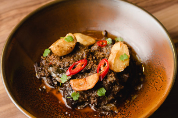Salt and Palm restaurant in Glebe serves Indonesian cuisine, such as a traditional beef rendang curry.