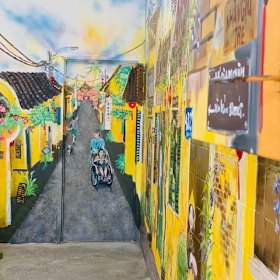 The wall mural by Vietnamese artist Dao Thanh Dat.
