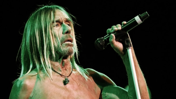 Iggy Pop quickly dispenses with his shirt at the Sydney Opera House.
