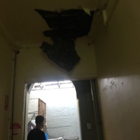 Residents had previously complained of overcrowding and damage to the ceiling of the building’s shared kitchen.